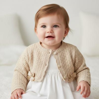 BOMC7010ABi  Biscuit Bow Bolero  (0-9 months)