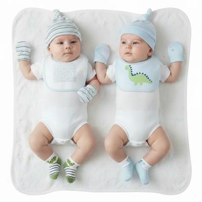 NT25-1358 8 Piece "Dino" Bib, Hat, Mitts and Socks Set (0-3m)