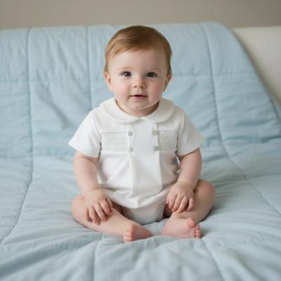 PX04550-I  Ivory Smocked Romper  (NB-6 months)