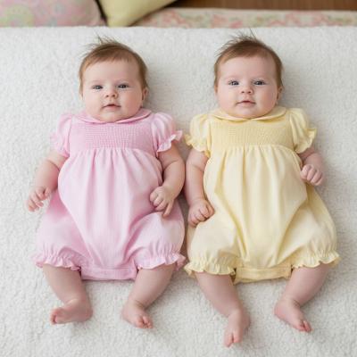 RBH12797PY  Striped and Smocked Romper  (0-9 months)