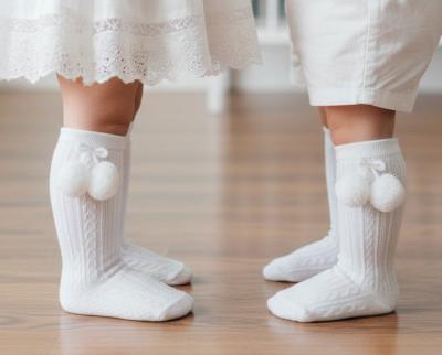 STS355-W  Elegance White Pom pom Sock  (0-24 months)
