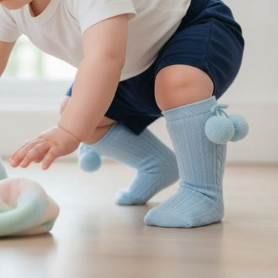 STS355-B-0-6 Elegance Sky Blue Pom pom Sock (0-6 months)