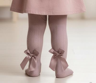 STT120-DP Dusky Pink Jaquard Tights with Long Bow (NB to 24m)