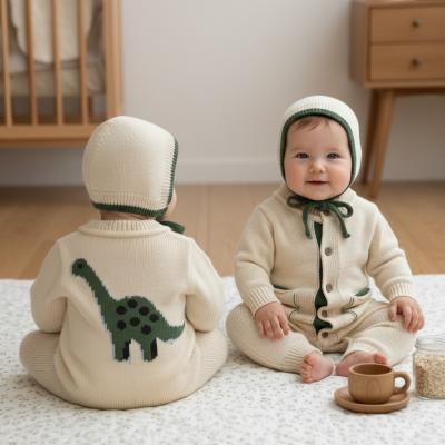 SV26061i Ivory Dinosaur Knitted Romper & bonnet (0-12 months)