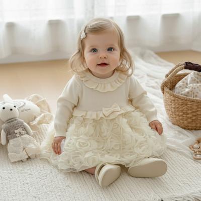 SV26003-I Ivory Knit and rosette dress (0-12 months)